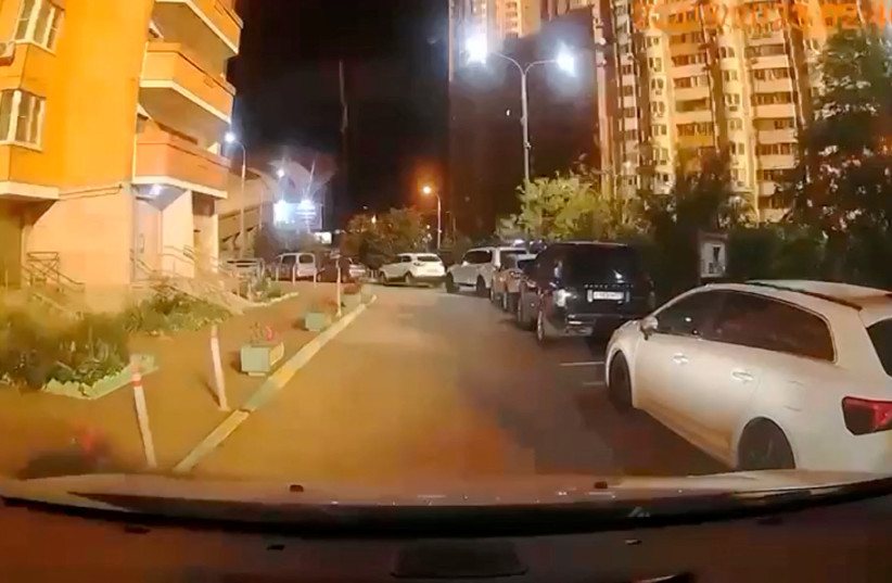 A view from a dashcam as the buildings glow orange on the day the Russian military brought down a drone, in Krasnogorsk, Moscow Oblast, Russia, August 22, 2023