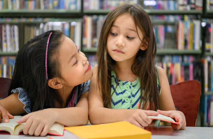  Two young girls are seen in a school library (illustrative) (credit: INGIMAGE)