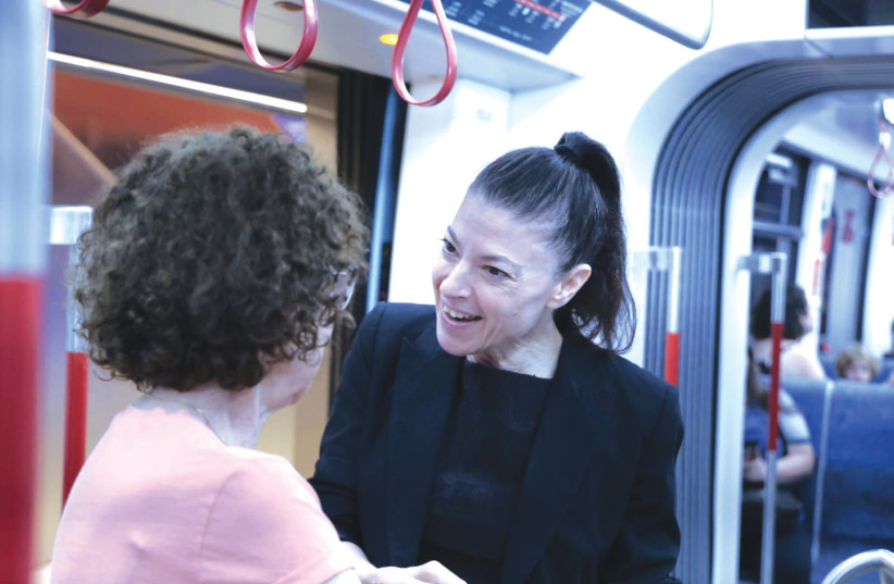  LABOR PARTY chairwoman and former transportation minister Merav Michaeli on the Tel Aviv Light Rail on the first day of its operation.  (credit: COURTESY LABOR)