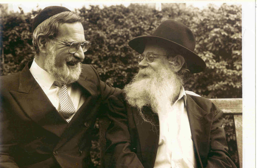  Rabbi Steinsaltz with Rabbi Jonathan Sacks on his 75th birthday. (credit: THE STEINSALTZ CENTER)