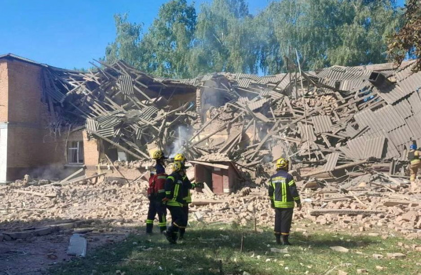  Rescuers work at the site of a Russian drone strike, amid Russia's attack on Ukraine, in Romny in Sumy region, Ukraine August 23, 2023. (credit: National Police/Handout via REUTERS)