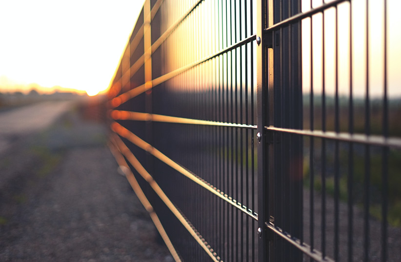  BY CAUTIONING us to build a fence, the Torah signals a broader message.  (credit: Simon Maage/Unsplash)