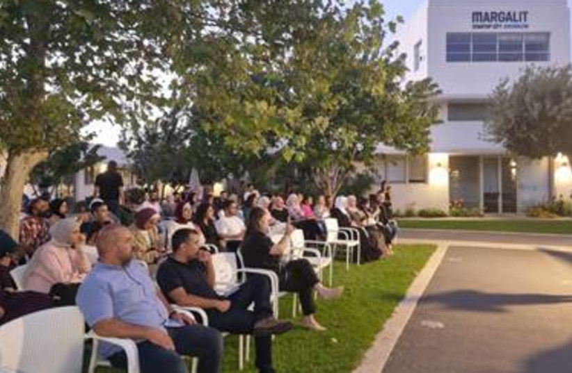 Palestinian families from Israel and east Jerusalem gathered to celebrate the culmination of the first “BaKehila Gap Year” at Margalit Startup City Jerusalem (credit: Credit: Bakehila)