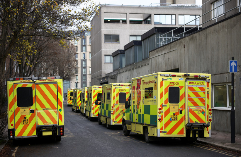  A view of ambulances parked along a street, as ambulance workers strike, amid a dispute with the government over pay, near the NHS London Ambulance Service, in London, Britain December 21, 2022. (credit: HENRY NICHOLLS/REUTERS)
