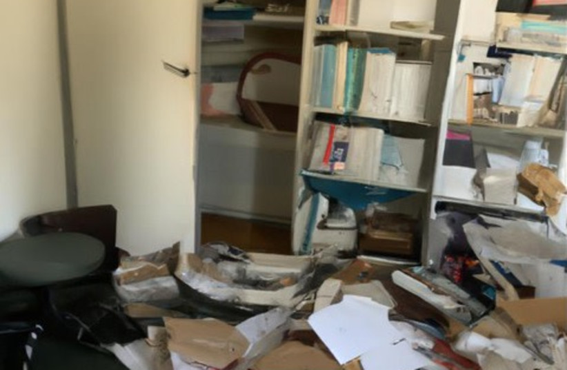  A Holocaust survivor's ransacked home is seen in this edited photo after robbers invaded. (credit: NOAM ATIA)