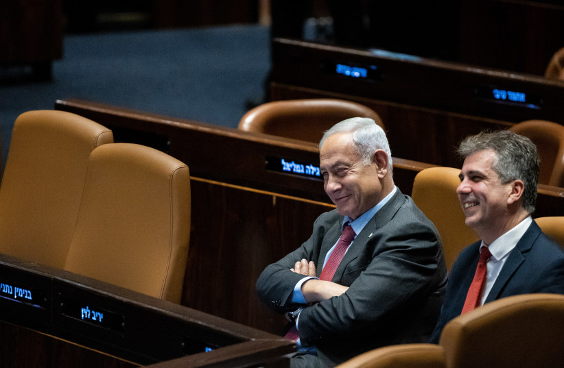  Israeli Prime Minister Benjamin Netanyahu with Israeli Foreign Affairs Minister Eli Cohen assembly hall of the Knesset, the Israeli parliament in Jerusalem, on March 13, 2023.  (credit: YONATAN SINDEL/FLASH90)