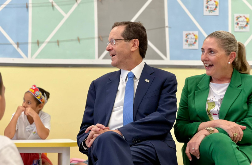  President Isaac Herzog and his wife Michal join Israeli children on their first day of school on September 1, 2023.  (credit: PRESIDENT'S RESIDENCE)