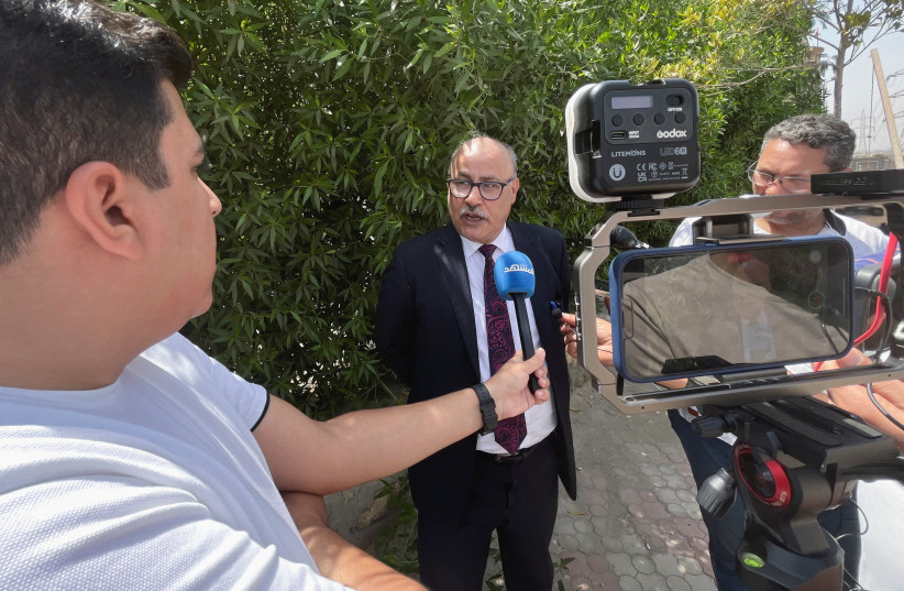 Nasser Amin, defence lawyer in the trial of Hisham Kassem, an Egyptian politician opposition leader and co-founded al-Tayar al-Hurr ''Free Current'', talks to media outside the Cairo Economic Court in Cairo suburb of Maadi, Egypt, September 2, 2023. (credit: Amr Abdallah Dalsh/Reuters)