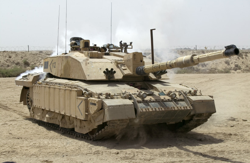  Soldiers of 1 A Squadron, Queens Royal Lancers (QRL) patrolling outside Basra, Iraq onboard a Challenger 2 Main Battle Tank during Operation Telic 4.  (credit: Graeme Main/MOD/WIKIMEDIA COMMONS)