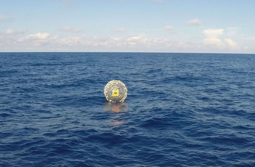  This October 4, 2014 file US Coast Guard handout photo shows the Coast Guard Cutter Bernard C. Webber arriving on scene off the coast of Miami to respond to a report of a man aboard an inflatable hydro bubble who needed assistance. (credit: AFP PHOTO / HANDOUT / US Coast Guard / PO3 Mark Bar)