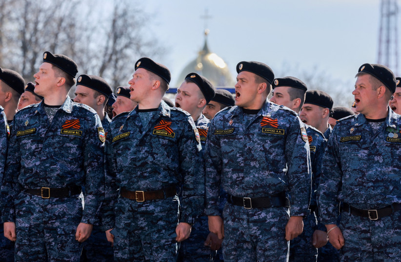  Russian service members attend a military parade on Victory Day, which marks the 78th anniversary of the victory over Nazi Germany in World War Two, in Veliky Novgorod, Russia May 9, 2023. (credit: REUTERS/Anton Vaganov/File Photo)