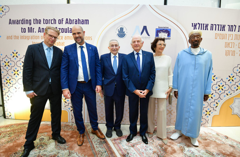  Left to right: Jonathan Riss, Amir Ohana, Rabbi Marvin Hier,  Mr. André Azoulay, and his wife, and Professor Imam Mohammed Amine Smaili, (credit: RAFI BEN HAKOON)