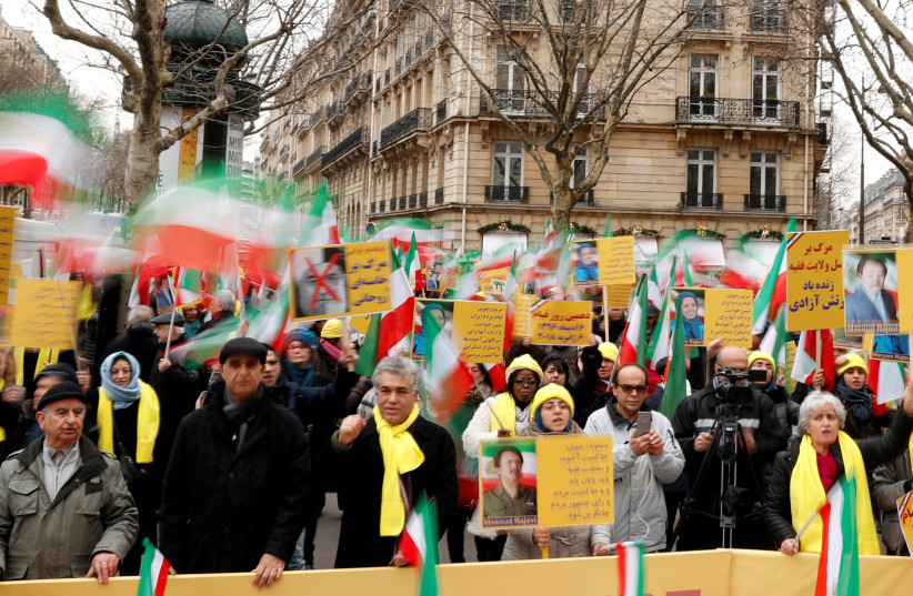 People demonstrate in solidarity with anti-government protests in Iran near the Iranian embassy in Paris, France, January 6, 2018. (credit: Gonzalo Fuentes/Reuters)