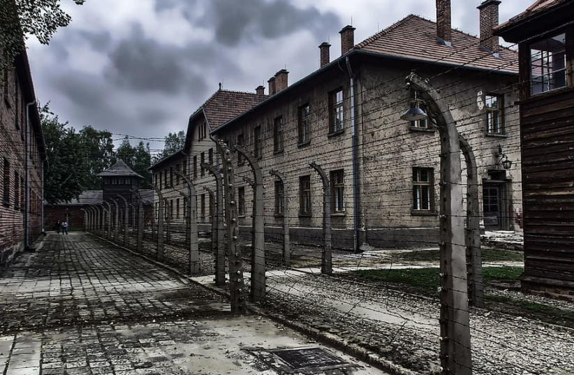   Auschwitz concentration camp, operated by Nazi Germany in occupied Poland during the Holocaust. (credit: WALLPAPER FLARE)