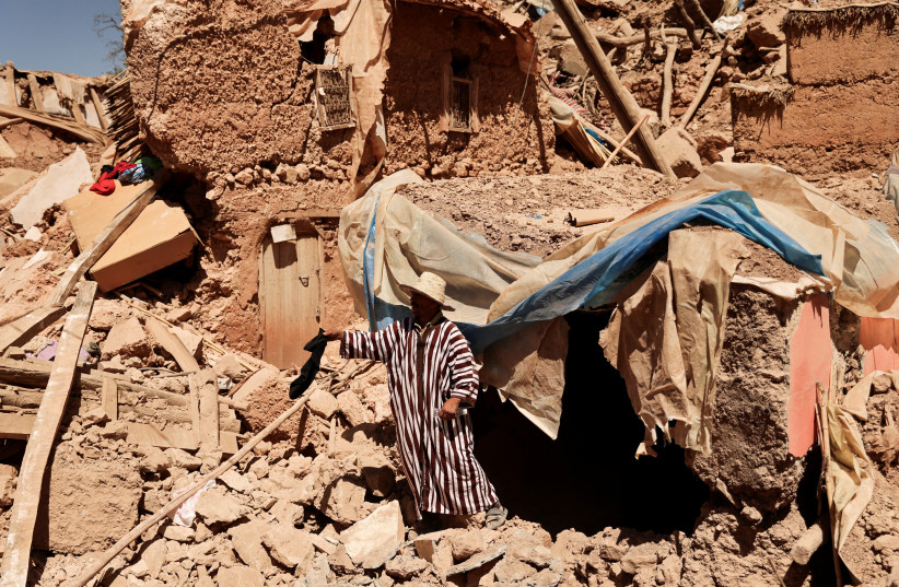  Mohamed Ouchen, 66, a survivor, who helped to pull his sister and her husband with their children from rubble, stands near his destroyed house, in the aftermath of a deadly earthquake, in Tikekhte, near Adassil, Morocco, September 11, 2023. (credit: REUTERS)