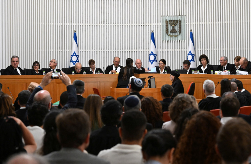  President of the Supreme Court of Israel Esther Hayut and all fifteen justices assemble to hear petitions against the reasonableness standard law in the High Court in Jerusalem, on Tuesday, September 12, 2023. (credit: DEBBIE HILL/REUTERS)