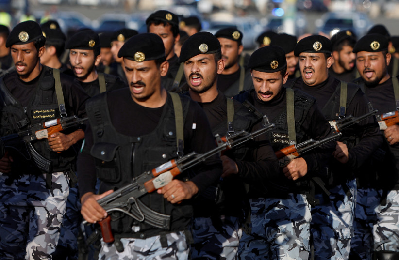  Saudi security forces march during a parade in preparation for the annual haj pilgrimage in Mecca, Saudi Arabia, July 3, 2022. (credit: REUTERS/MOHAMMED SALEM)