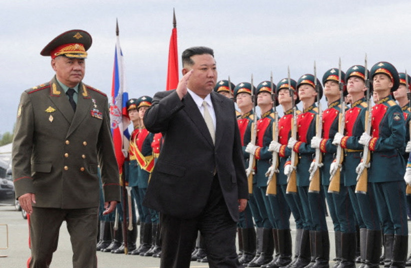  North Korea's leader Kim Jong Un and Russia's Defence Minister Sergei Shoigu inspect the guard of honour at Knevichi aerodrome near Vladivostok in the Primorsky region, Russia, September 16, 2023.  (credit: Russian Defence Ministry/Handout via REUTERS)