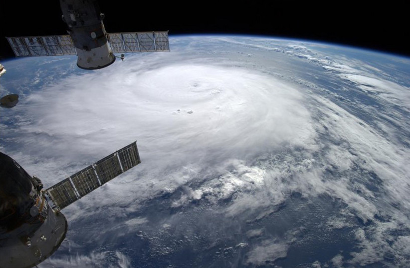 Hurricane Gonzalo is seen over the Atlantic Ocean in this NASA image taken by astronaut Alexander Gerst from the International Space Station. (credit: REUTERS/NASA/Alexander Gerst/Handout via Reuters)