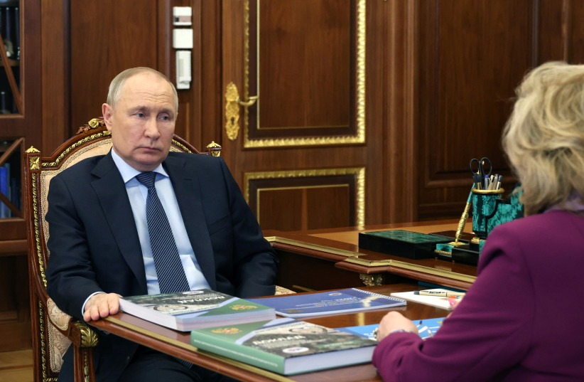  Russia's President Vladimir Putin attends a meeting with Human Rights Commissioner Tatyana Moskalkova in Moscow, Russia, May 15, 2023 (credit: SPUTNIK/MIKHAIL KLIMENTYEV/KREMLIN VIA REUTERS)