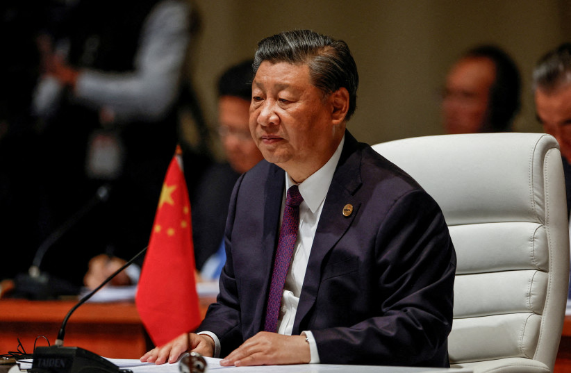  Chinese President Xi Jinping attends the plenary session of the 2023 BRICS Summit at the Sandton Convention Centre in Johannesburg, South Africa on August 23, 2023. (credit: GIANLUIGI GUERCIA/Pool via REUTERS/File Photo)