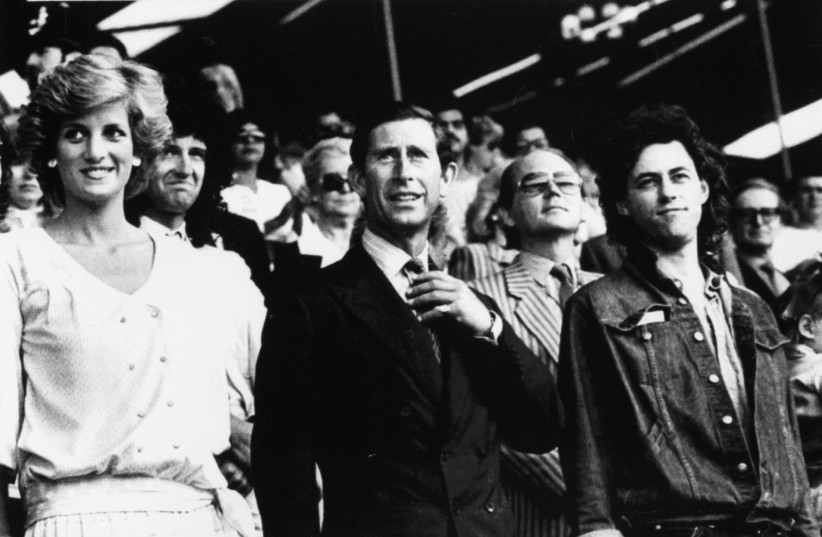 PRINCESS DIANA and Prince Charles stand with Bob Geldof in the Royal Box at Wembley Stadium in London at the start of the Live Aid concert in 1985.  (credit: Rob Taggart/Reuters)