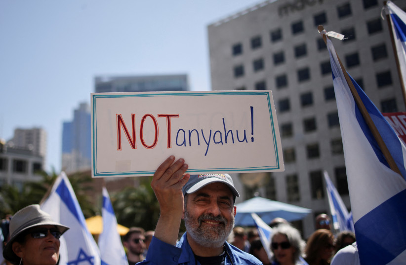 People gather to protest Israeli Prime Minister Benjamin Netanyahu's visit to California as he is scheduled to meet with entrepreneur Elon Musk, at Union Square in San Francisco, California, US. September 18, 2023. (credit: Carlos Barria/Reuters)
