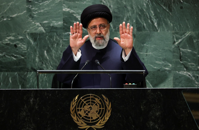 Iran's President Ebrahim Raisi gestures to the audience inside the United Nations General Assembly hall as he completes his address to the 78th Session of the UN General Assembly in New York City, US. September 19, 2023. (credit: Mike Segar/Reuters)