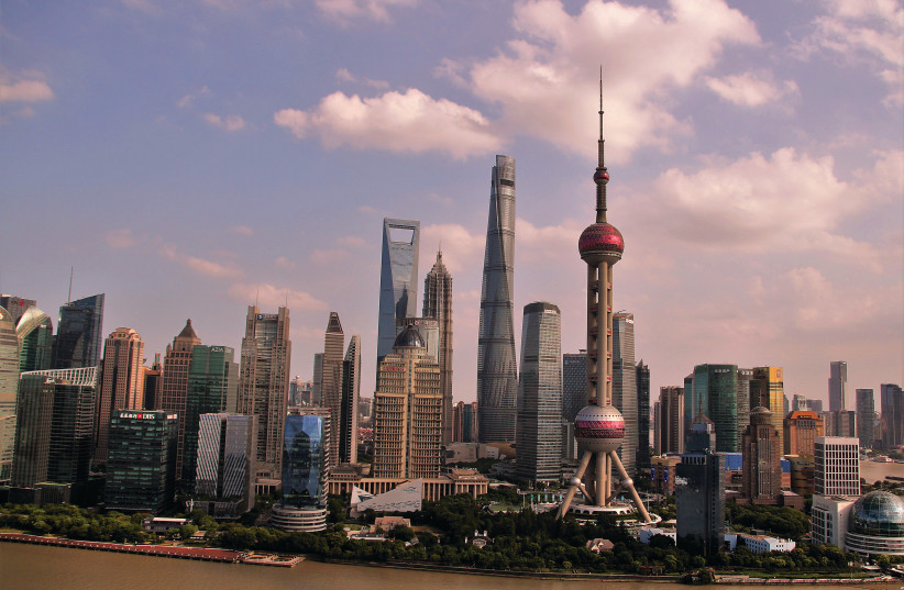  THE SPECTACULAR skyline of the Shanghai business district on the banks of the Huangpu River. (credit: ORI LEWIS)