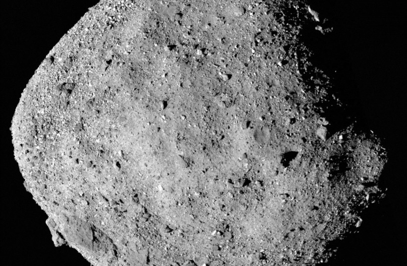  This mosaic image of asteroid Bennu, composed of 12 PolyCam images collected on December 2, 2018 by the OSIRIS-REx spacecraft from a range of 15 miles (24 km). (credit: NASA/Goddard/University of Arizona/Handout via REUTERS)