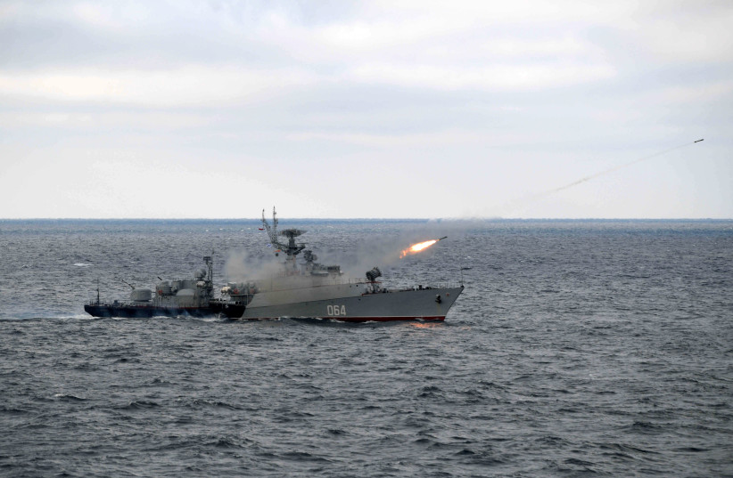  Russian anti-submarine corvette Muromets fires during the joint drills of the Northern and Black Sea fleets, attended by Russian President Vladimir Putin, in the Black Sea, off the coast of Crimea January 9, 2020 (credit: SPUTNIK/ALEXEI DRUZHININ/KREMLIN VIA REUTERS)