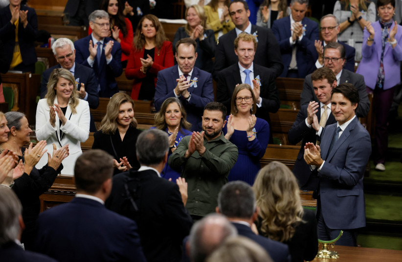  Ukraine's President Volodymyr Zelenskiy is applauded by Canadian Prime Minister Justin Trudeau following his speech at the House of Commons on Parliament Hill in Ottawa, Ontario, Canada September 22, 2023. (credit: REUTERS/Blair Gable/Pool)