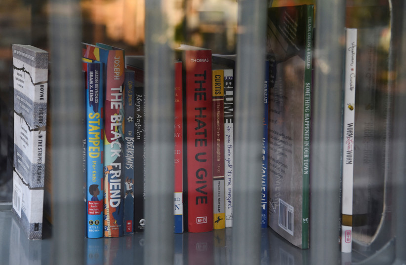  A Little Free Library, which was designed to look like a prison, invites residents to take books that the library says have been challenged by schools across the state of Texas, in Houston, Texas, U.S. May 3, 2023. (credit: REUTERS/CALLAGHAN O’HARE)