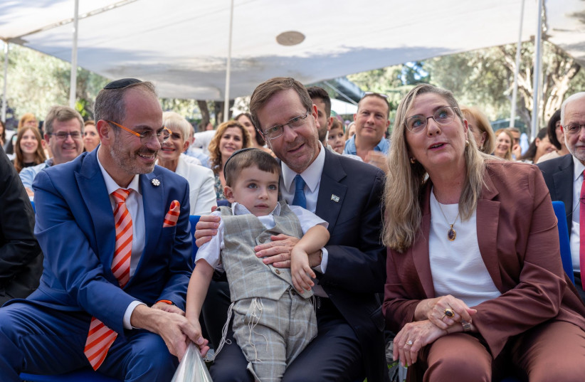  Eli Beer, President Herzog, Michal Herzog, and the boy that was saved. (credit: KOBI GIDEON/GPO)