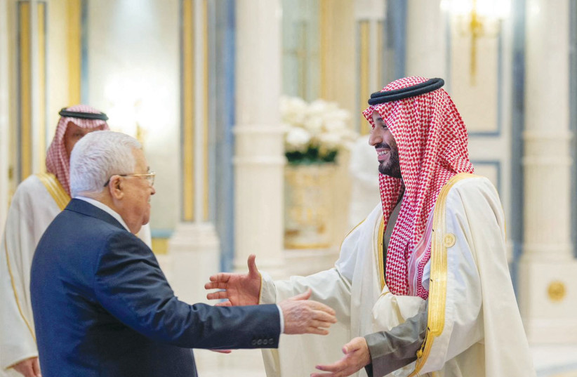  SAUDI CROWN Prince Mohammed bin Salman greets Palestinian Authority head Mahmoud Abbas during the China-Arab summit in Riyadh, last year. (credit: SAUDI PRESS AGENCY/REUTERS)
