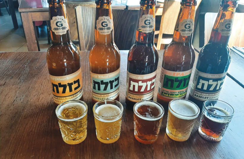  THE BAZELET range of beers from the Golan Brewery, at Katzrin in central Golan. (credit: ADAM MONTEFIORE)