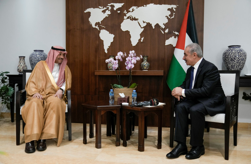  Nayef al-Sudairi, Saudi Arabia's first-ever Saudi ambassador to the Palestinian Authority, left, speaks with Palestinian Prime Minister Mohammad Shtayyeh, during their meeting in the West Bank city of Ramallah, Wednesday, Sept. 27, 2023. (credit: MAJDI MOHAMMED/POOL VIA REUTERS)