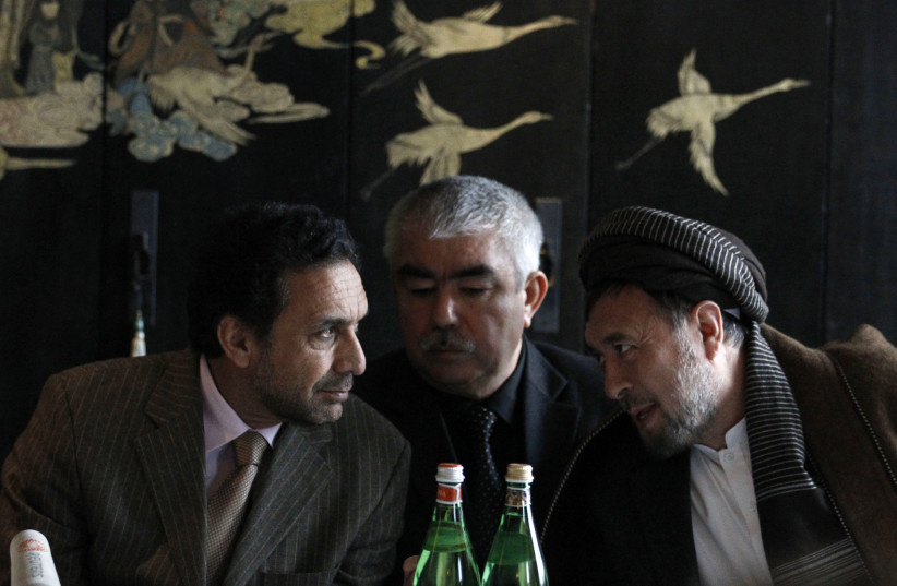 Afghan Chairman of National Front Ahmed Zia Massoud (left) a news conference after talks between U.S. members of Congress and Northern Alliance representatives in Berlin January 9, 2012.