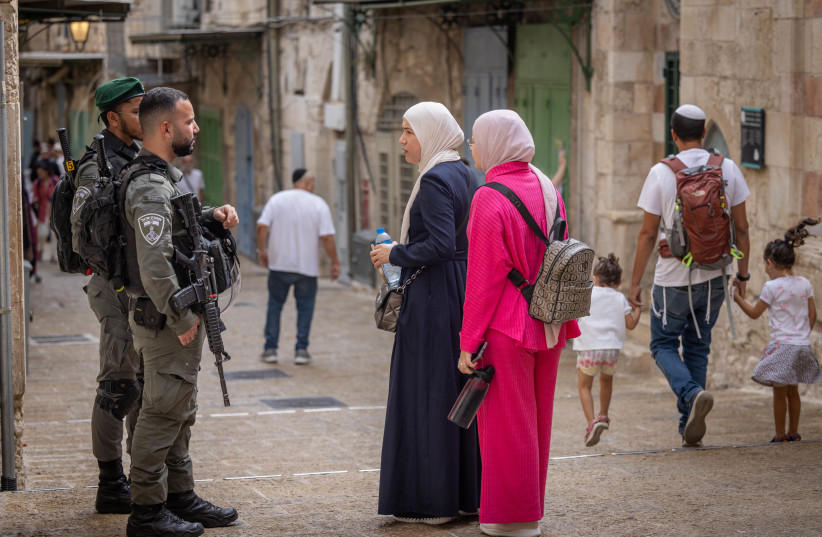  Israeli border police check Arab women  in Jerusalem's Old City, during the Sukkot holiday. October 03, 2023. (credit: Chaim Goldberg/Flash90)