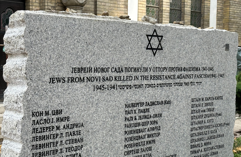  A memorial in the courtyard of the synagogue in Novi Sad, Serbia’s second-largest city, lists the names of Jewish partisans killed while fighting the Nazis during World War II.  (credit: LARRY LUXNER/JTA)