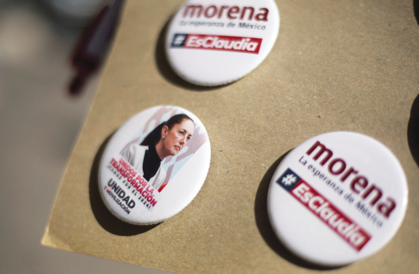  MERCHANDISE FEATURING Sheinbaum is sold on the day she is certified as presidential candidate for the ruling National Regeneration Movement (MORENA) party, in Mexico City, Sept. 10 (credit: Quetzalli Nicte-Ha/REUTERS)