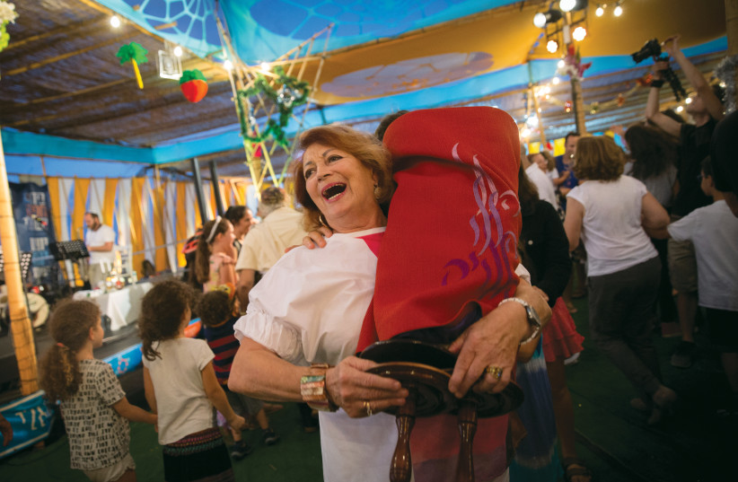  THE JOY of getting close to the Torah (credit: MIRIAM ALSTER/FLASH90)