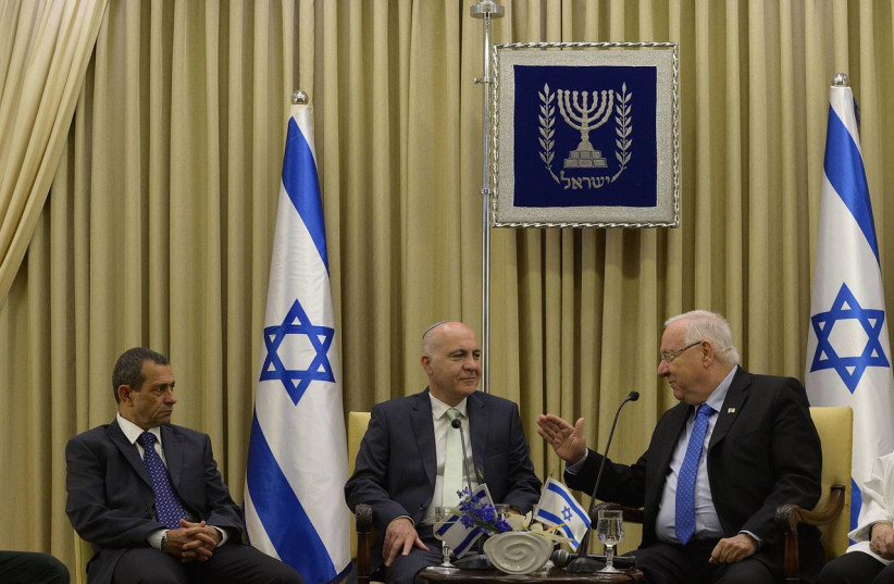  Reuven Rivlin, then president of Israel, with Yoram Cohen, the former director of the Shin Bet, and Nadav Argaman, then the current director. May 2016 (credit: PRESIDENTIAL SPOKESPERSON OFFICE)