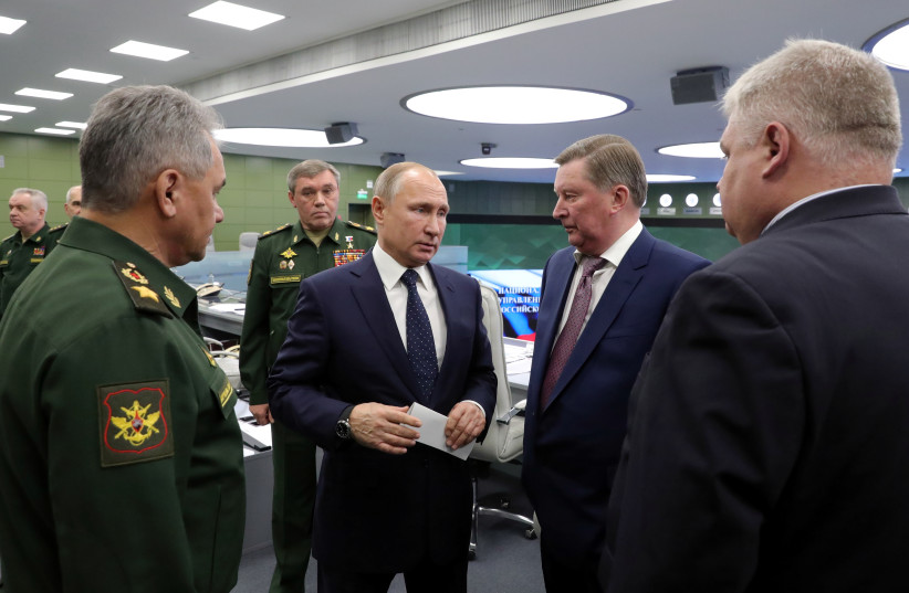  Russian President Vladimir Putin visits the National Defence Control Centre in Moscow, Russia December 26, 2018. (credit: SPUTNIK/MIKHAIL KLIMENTYEV/KREMLIN VIA REUTERS)