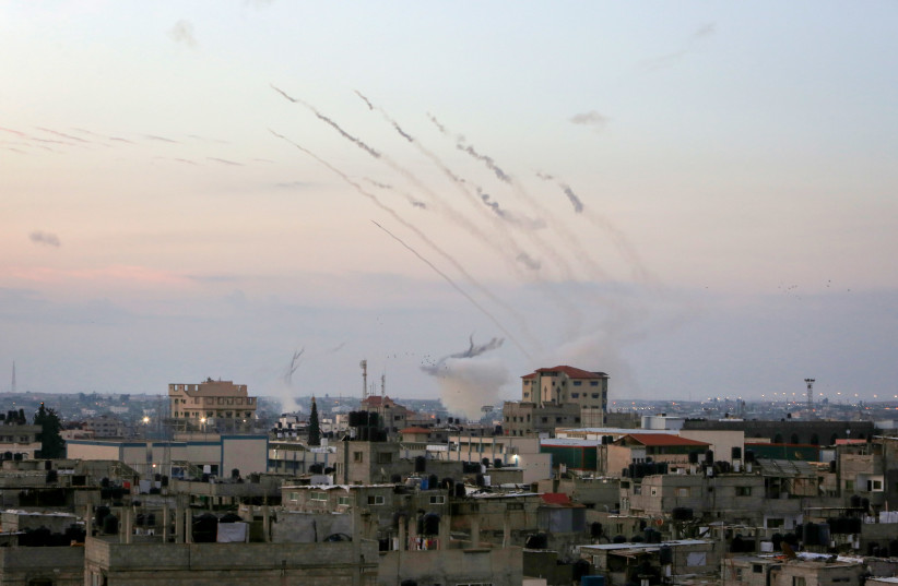  Hamas fires a large number of rockets towards Israel in the city of Rafah in the southern Gaza Strip, October 7, 2023 (credit: ABED RAHIM KHATIB/FLASH90)