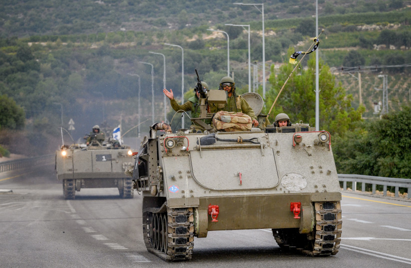  A convoy of Armored personnel carrier on a main road near the Israeli border with Lebanon, northern Israel, October 9, 2023. (credit: AYAL MARGOLIN/FLASH90)