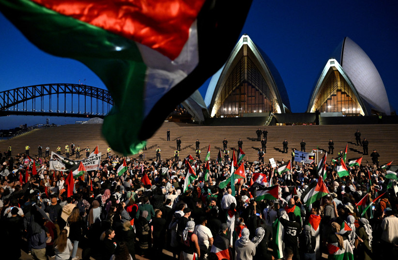  Participants of a pro-Palestinian rally react outside the Sydney Opera House in Sydney, October 9, 2023.  (credit: AAP IMAGE/DEAN LEWINS VIA REUTERS)
