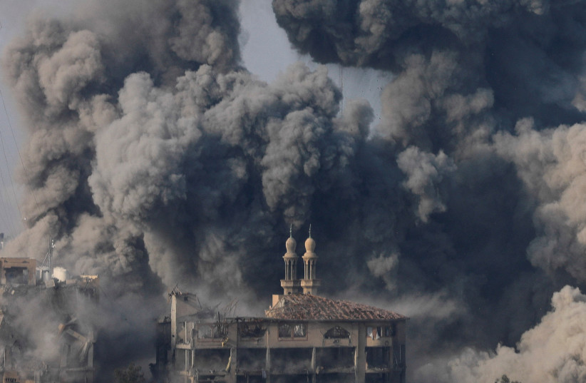  Smoke billows following Israeli strikes in Gaza City, October 11, 2023. (credit: Saleh Salem/Reuters)