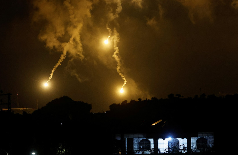  Flares, fired from the Israeli side, burn in the sky as seen from Ramyah near the Lebanese-Israeli border, in southern Lebanon, October 11, 2023 (credit: REUTERS/THAIER AL-SUDANI)