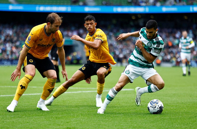  Celtic's Liel Abada in action with Wolverhampton Wanderers' Matheus Nunes (credit: REUTERS/CLODAGH KILCOYNE)